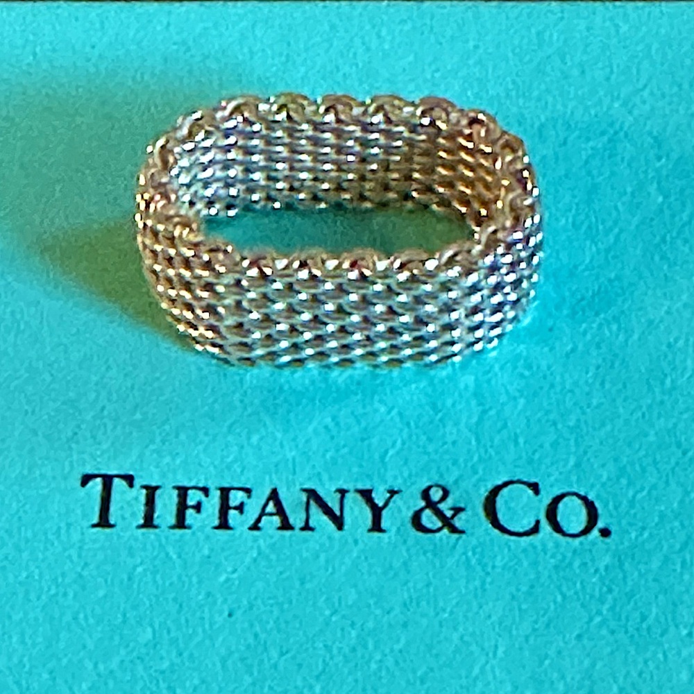 Tiffany & Co. sterling Silver Mesh Ring size 7 but fits snug.